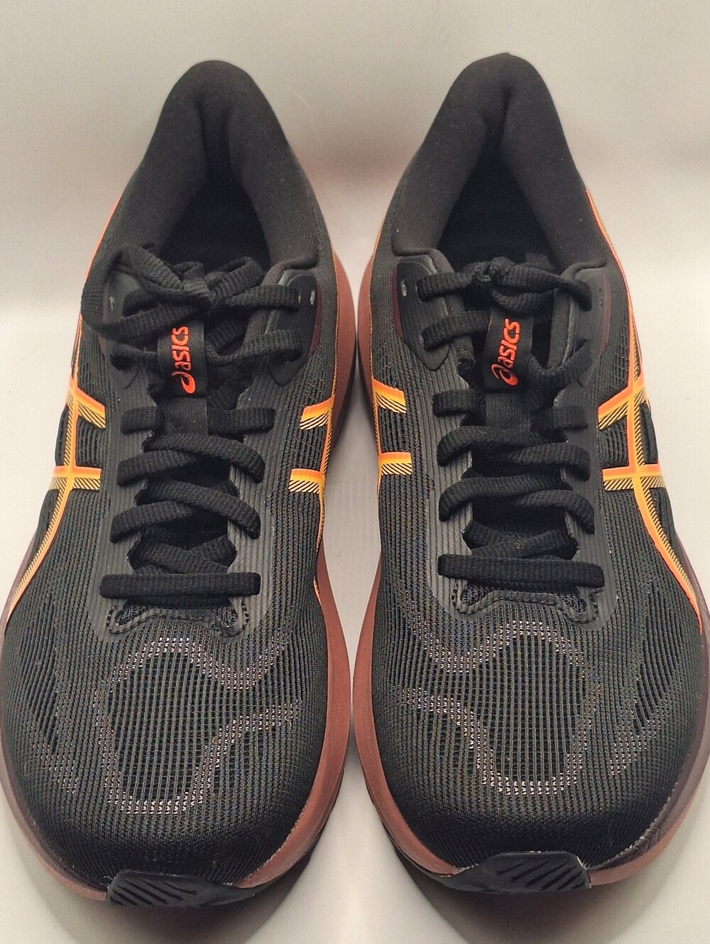 ASICS-GT 1000 Women Sneakers Black with Vivid Coral Stripes. Used once Size 9.5